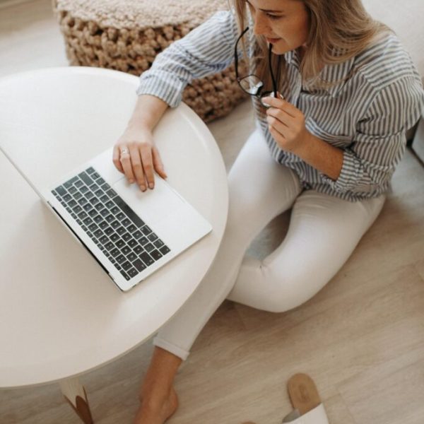fire-starter-home-image-1 Woman At Computer With No Shoes